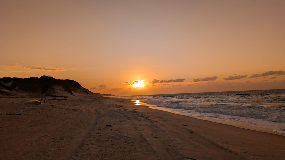 Sunset over the beach of the indian Ocean in Mozambique