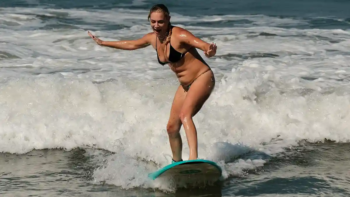 Standing First Time Surfing