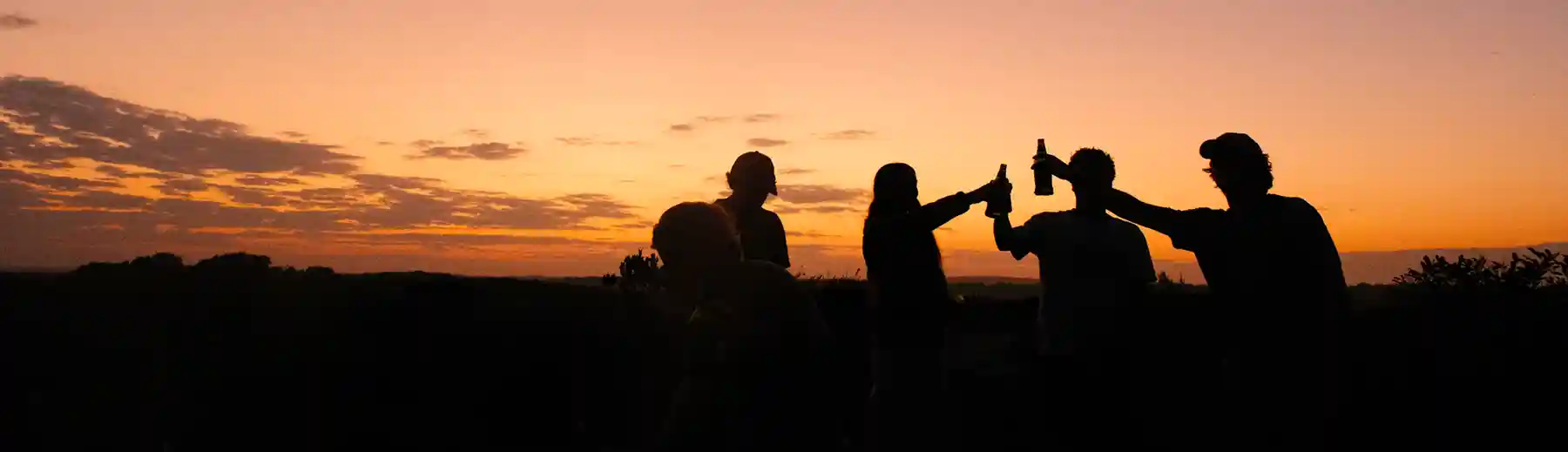 Sunset, good company, and a toast to life on the Wild Coast.
